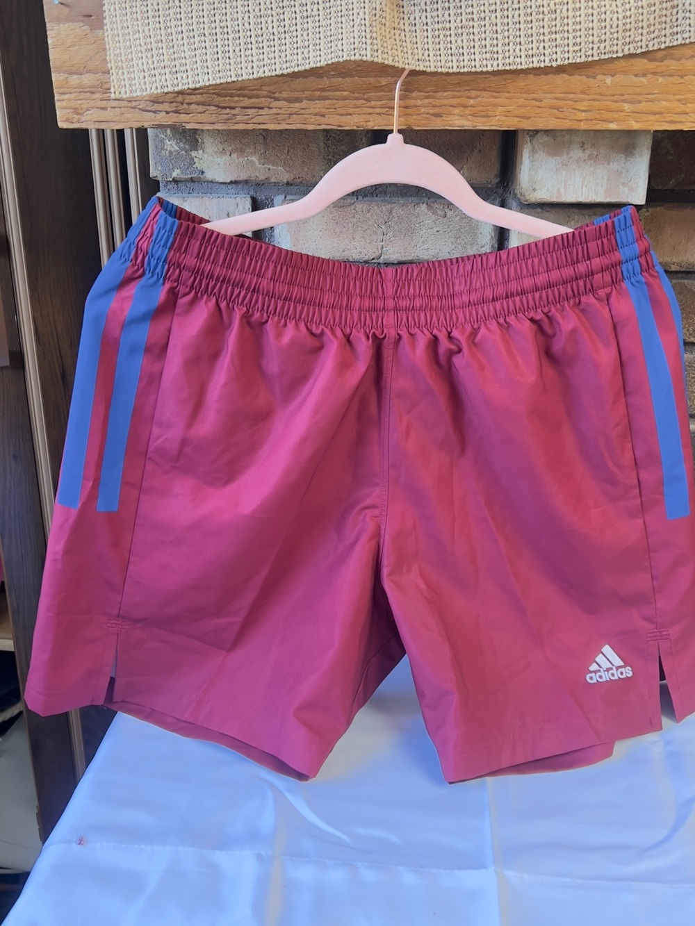 adidas Men's Pink Athletic Shorts with Blue Side Stripes